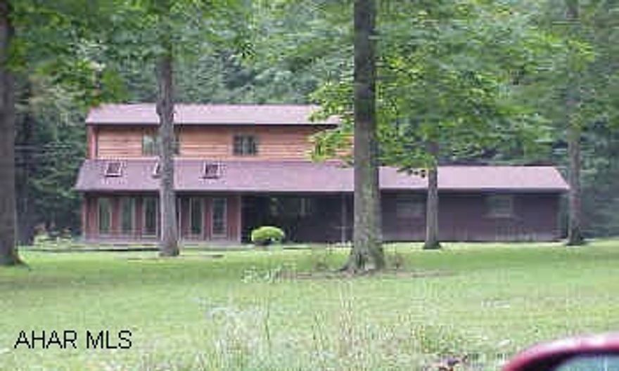 Very pretty setting with stream.  Nice size rooms.  Large kitchen with ceramic tile.  Big living room with hardwood floors and brick fireplace with insert.