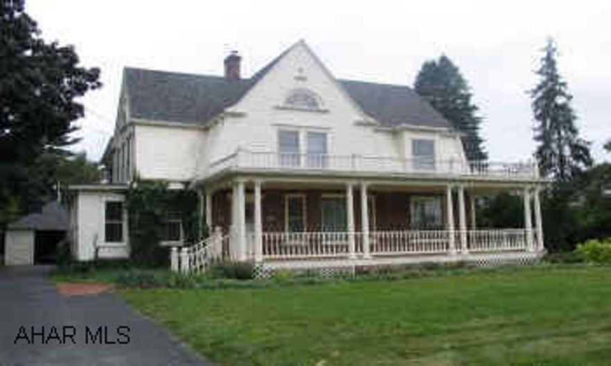 Upscale showplace, 5 bedroom, 2 full and 3 half bath home. Airy interior, large rooms, beautiful staircase, 3-fireplaces. This home has many unique features that were created by individual craftsmen.