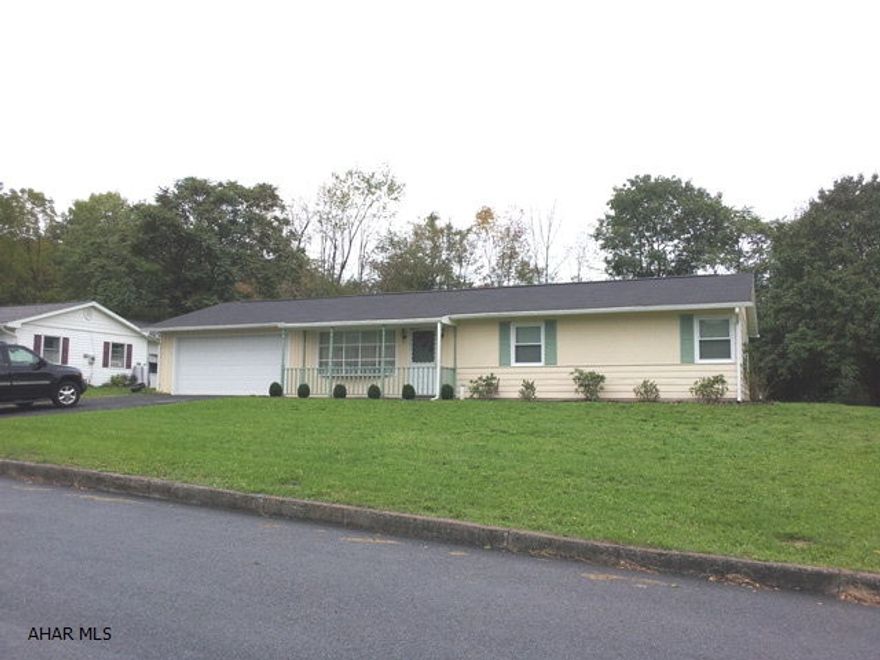 3 bedroom frame rancher with family room. Garage was converted to workshop and family room. No basement. Seller to make allowance or install Trane Heat Pump.