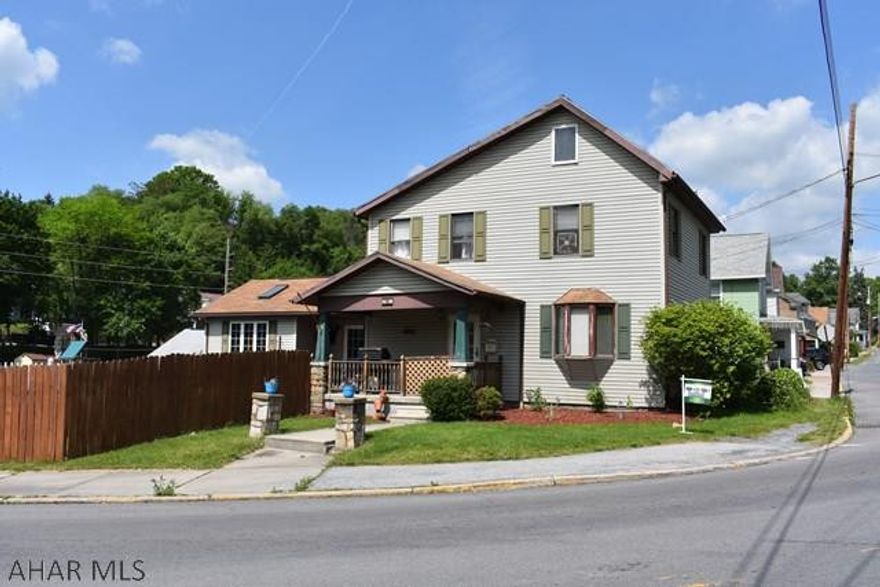 Looking for a home in town with a lot of outdoor space? Look no further.  This large 3 bedroom home features a partially covered deck, above ground pool, fenced in yard and a basketball court.  Watch television from your deck while the kids swim, just in time for summer.  This is a must see.  Call listing agent today for a showing.