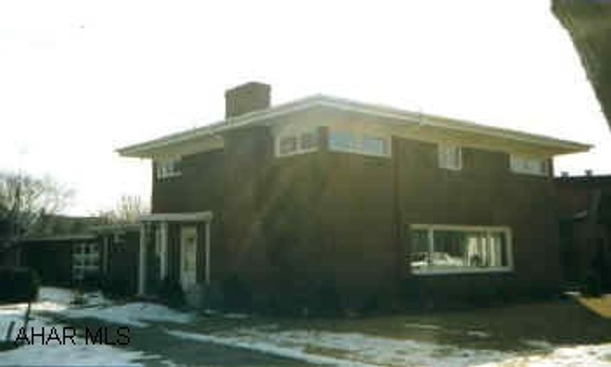 BRICK 2 STORY VERY SPACIOUS 4 BEDROOM BRICK IN MANSION PARK AREA.  LARGE LIVING ROOM, DINING ROOM, 2 FAMILY ROOMS, EAT-IN KITCHEN, FINISHED BASEMENT, EXTRA LARGE GARAGE, C/A.