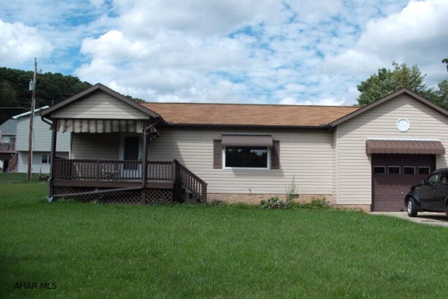 This house is on a great 250 x 120 lot. 2 bedrooms, 2 baths, open floor plan.  Living room, dining room and kitchen is one big room.  1 car attached and 1 car detached + 3 carports.  1 for RV.  Covered front porch and covered rear patio.  Owner out of area and Wants offers!