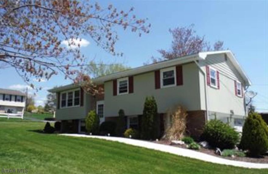 Looking for a beautiful forever home?  Look no further.  Located within the Foot of Ten Elementary boundary, this move-in ready home, located on a corner-lot, offers a large yard in a family-oriented, quiet neighborhood.  The home has been lovingly cared for, offering new laminate flooring, a beautiful hand-crafted, cherry entertainment center, as well as hand-crafted built-ins throughout.  There is plenty of storage space inside and out, including the large, two-car garage and two sheds.  You won't want to let this one get away!