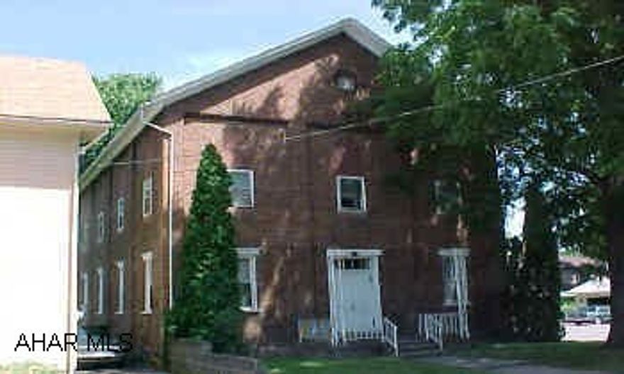 4 units- eacj unit has 2 bedrooms, living room, kitchen and bath(all separate utilities) owners pay water and sewer and lawn care.  New roof with 30 yr. guarantee - 7/02.