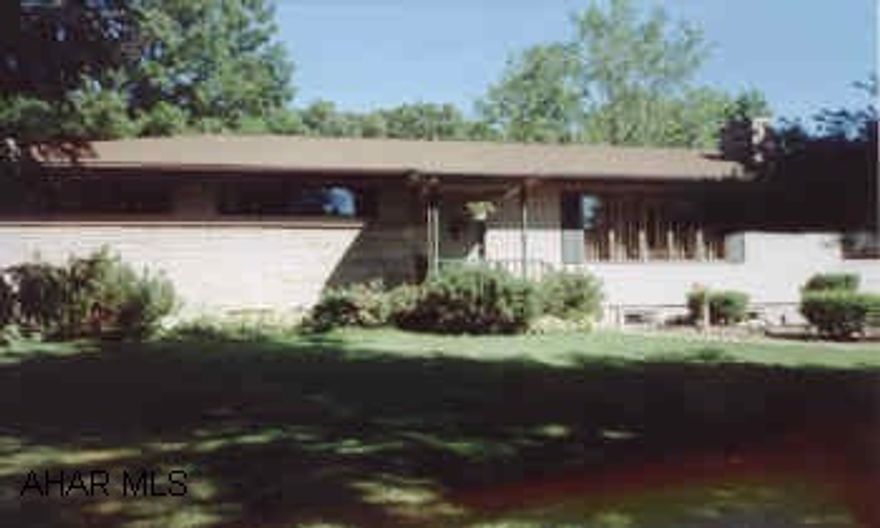 Ranch style home on 1.46 acres 2 Fireplaces, central air, family room in basement, new kitchen with oak cabinets