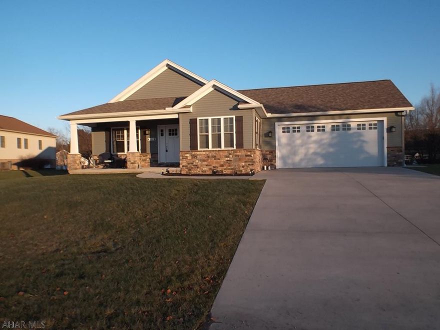Open Floor Concept 2016 Craftsman style home with a  beautiful Hickory kitchen with Quartz countertops, great center island and stainless steel appliances are included.  3 bedrooms and 3 full baths with a finished lower level that has a family room, bedroom, full bath  and lots of storage.  Extra area could be finished for another family room, rec room or another large bedroom.  Main floor laundry room with lots of storage. Large master bedroom with a walk-in closet and full bath. Great front porch to sit out on in the summer and fall. Back boasts a covered deck for additional outside space. House is wired for central vac, just needs the unit.  This home is move in ready with absolutely nothing needing to be done!