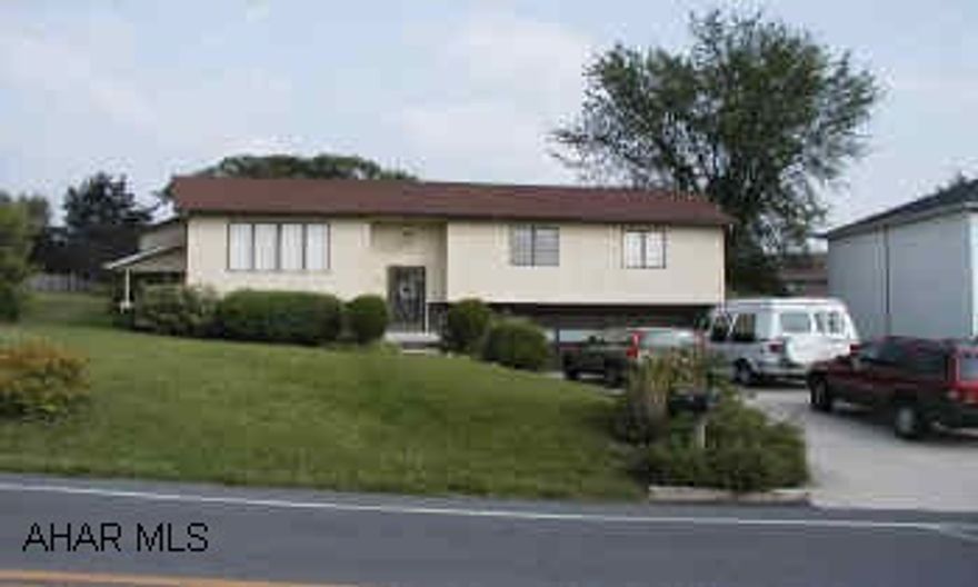 Not your typical bi-level; beautiful family room addition with laundry room and extended bedroom suite. Large rear deck for entertaining.