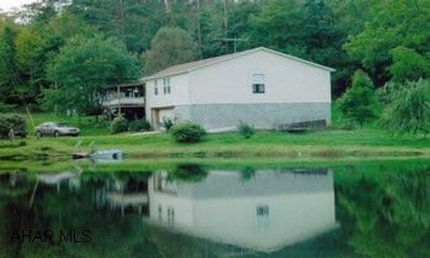 Rancher, partial remodeled 3BR/2BA, 29+/- acres, 1 acre pond, mostly wooded, private, good hunting, fishing, great get-away property.