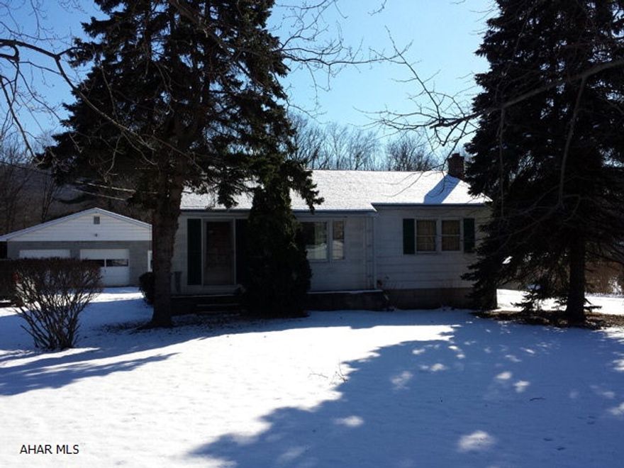 Nice 2 bedroom rancher with 2 car detached garage on almost 3/4 acre in Bald Eagle. Enclosed porch. Nice lot.