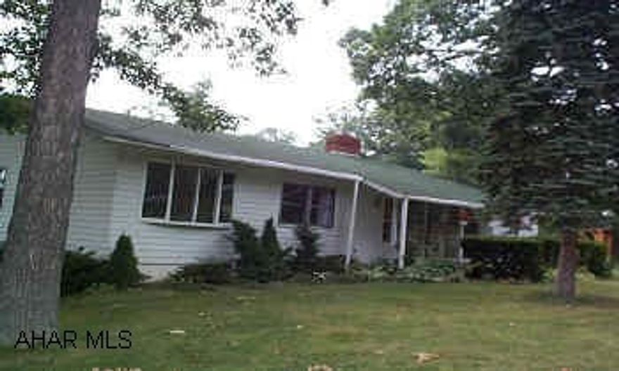 A real cutie, larger than appears.  Move in condition, new paint and flooring.  Was three bedroom.  Easy to convert.  Pretty cherry kitchen, with eating bar, all appliances.  Nice, corner lot, partially covered deck area, large workshop.  A real cutie larger that appears.  Move in condition, new paint and flooring.  Was three bedroom.  Easy to convert.  Pretty cherry kitchen, with eating bar, all appliances.  Nice, corner lot, partially covered deck area, large workshop.  Two fireplaces, central heat and AC.