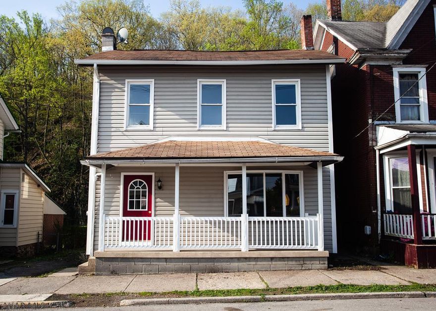 This house is priced to sell!!! Front porch, deck, yard, and stream behind house. NEW carpet. NEW flooring. NEW kitchen. NEW appliances. Off street parking.