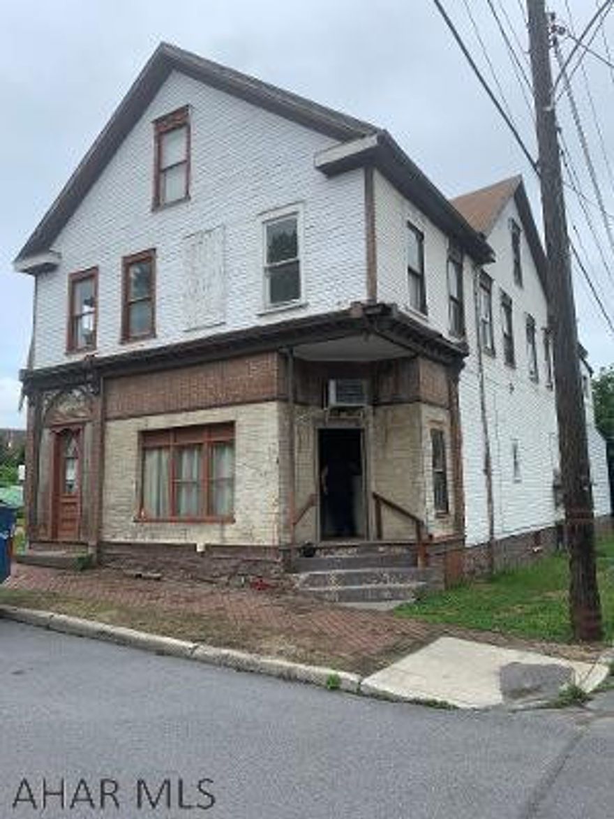 4 Rental Units - Home has 2 apartments rented.  Needs work.  Great for investor.  Cash deal.  Possibility having 5 units.  Currently 3.