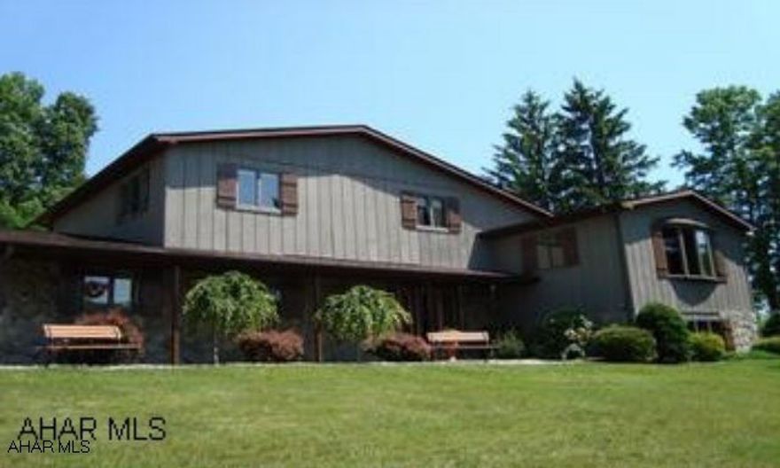 LARGE UPDATED MULTI-LEVEL IN BELLWOOD SCHOOLS ON A 1.5 ACRE LOT. CERAMIC TILE, HARDWOODS & GRANITE. 4 CAR STALLS. HOME INSPECTION DONE. HOME WARRANTY INCLUDED. VIDEO E-MAILED UPON REQUEST.