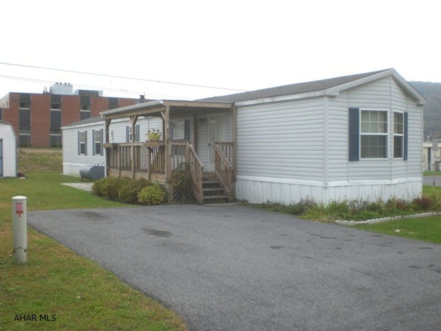 Very Nice 2001, 14'x76' single wide. 2-Bed, 2-Bath, Kit, LR & Laundry Room. Front & Rear porches. Lot rent is $250.00 per month & includes trash & snow removal. Nice single-wide.