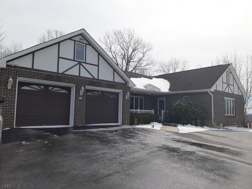 Views, privacy, cul-de-sac...its all here with this large 1 story brick and vinyl home located in Logan township!  The master bedroom has a full bath and walk in closet.  There is 1st floor laundry with 1/2 bath.   The finished lower level has 4 separate rooms if you are looking to have a family room, extra bedroom, office or game room.  You will never be without storage space in this home.  Enjoy the 3 season room off the kitchen or the deck off the dining room on a summer evening.  This home sits on .72 acres and has a 2 car heated garage.  Hurry...this one will not last long.