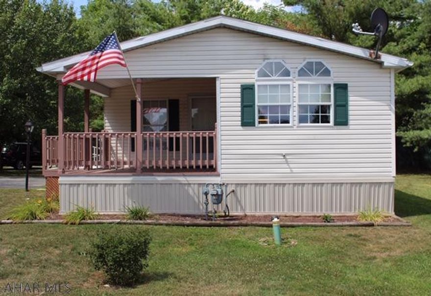 Exceptionally clean 2 bedroom/2 bathroom home located in Independence Park, a 55+ living community. Move-in ready! Convenient one-floor living with vaulted ceilings throughout   Eat-in kitchen, open living room/ dining room, laundry room.  Spacious master bedroom/bath featuring double sinks and a walk-in shower remodeled in September 2019.  Central air. Covered front porch for relaxing! For extra storage, there are two sheds included with this home!  Call to schedule your showing today!