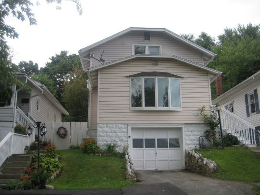 Motivated seller - bring offers! Super home in Pleasant Valley! This home features 3 bedrooms, 1.75 baths, eat-in kitchen, dining room, living room, & bonus room that could be a 4th bedroom or family room. Central air, 1 car garage, & much more! Extra lot included in sale - 321 Logan Avenue. Home warranty included.