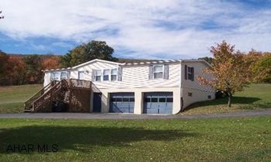 Well kept 3 bedroom, 1.75 bath ranch style home with screened-in porch, basement, and 2 car integral garage on 1+ acre!  Open floorplan, separate dining area, large closets, large master bath, PLUS basement has family room potential.  Stunning views, paved circular drive, just 2 miles from town!(DIRECTIONS:  Go West onto Pitt Street, turn Right onto Cumberland Road.)