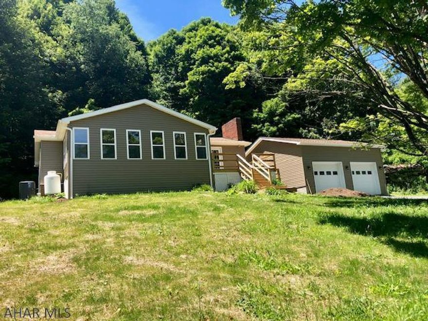 One story living in a beautiful country setting in Logan Township. This home has been completely remodeled. Brand new 2 car garage, heat pump, A/C, new furnace, new appliances, new wiring, and much more. Seller will be filling in the pool.