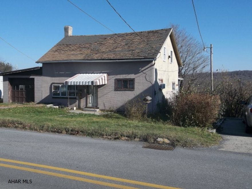 Nice lot, house needs lots of work.  Being sold as is.