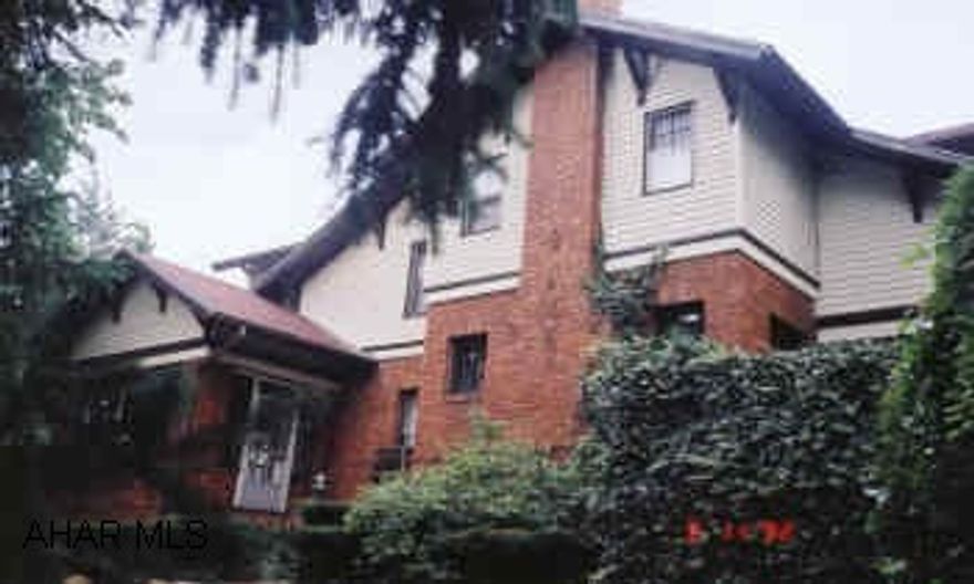 DUPLEXED BUT EASILY CONVERTED BACK TO RESIDENTIAL.  NEWLY VINYLED AND FIRST FLOOR NEW CARPETING.