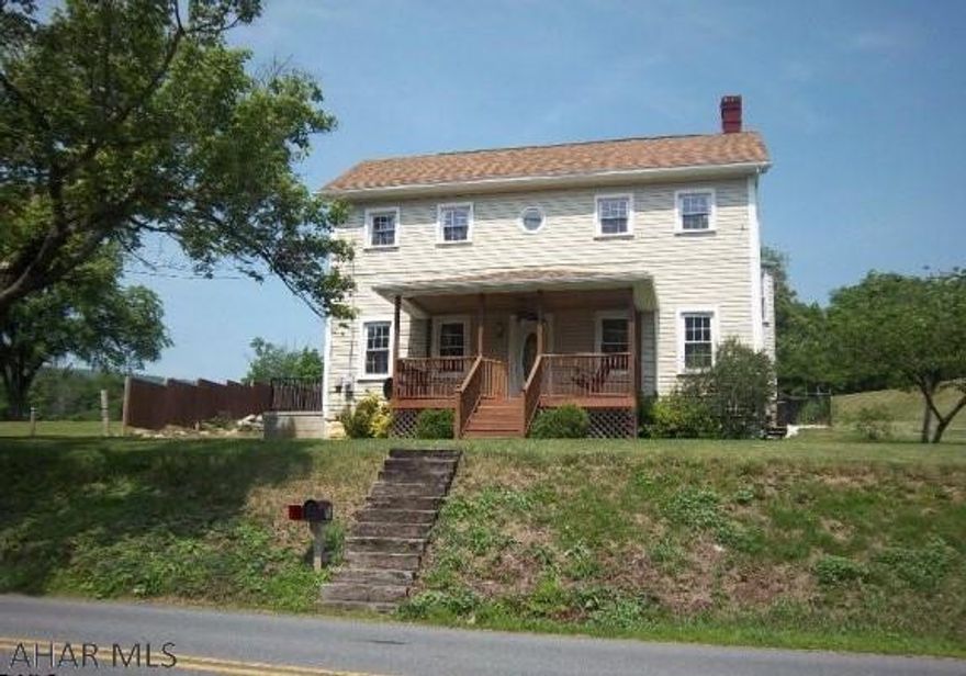 2 story home close to town with inground pool and pool house. Spacious home with marble floors and bar. Electric is not on. Being sold AS-IS.