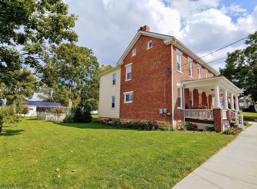 Home Warranty Included!  This 3 bedroom 2 bath brick & vinyl home offers a backyard oasis complete with a 21' pool and large patio. Rooms are large with high ceilings, and walk-in closets in all bedrooms! Beautiful, original woodwork adorns both the interior and exterior of the home. Fully renovated in 2015 with new windows, roof, pointing of brick and foundation, electrical and plumbing to name a few items that were replaced. Natural gas/hot water heat with gas lines run to both fireplaces provide for your choice of gas fired inserts in living room and dining room. Full walk-up attic with ample storage could be finished for even more living area!