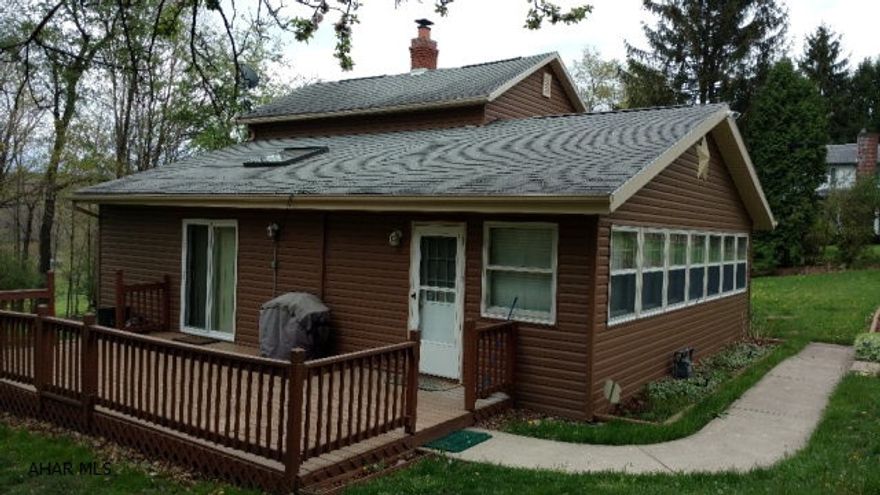 Beautiful home  boarders The Summit Country Club Golf Course.Low taxes,located in Gallitzin Township.located close to town yet private location.Looks can be deceiving..home is roomy inside.