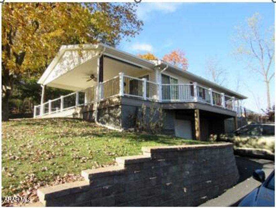 Ranch style home on .34 acre in Logan Township.  Move in condition.!  Large living room, modern kitchen.  Granite counter tops & stainless steel appliances.  Two bedrooms & modern baths.  Floor coverings are mostly laminate.  Lower level has a family room w/gas space heater, bath, laundry & walk-in cedar closet.  House is on a cul-de-sac street with a wrap around deck & fantastic views!  
New Year... New Home!