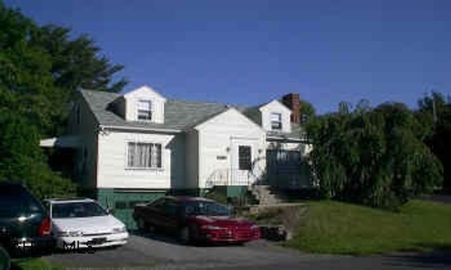 Lovely 3-bedroom, 1 1/2 Bath Cape Cod on triple city lot, Newer siding and roof, Elec, Hardwood floors, fireplace & more.