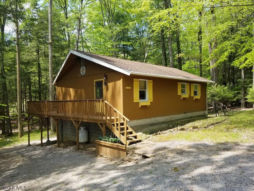 Perfect getaway cabin for sale in Glendale Yearound. 3 bedroom and 1 bathroom on 1 floor. This cabin is located on one lot on the main road in Glendale Yearound. There is a full unfinished basement with a one car garage. Behind the cabin there are woods and a fireplace area. Very close to the pool area. Just right for long weekends and time away from the big city. Glendale Yearound is a gated community located minutes from Glendale Lake and Prince Gallitzin State Park. Community pool, basketball, tennis, and more.