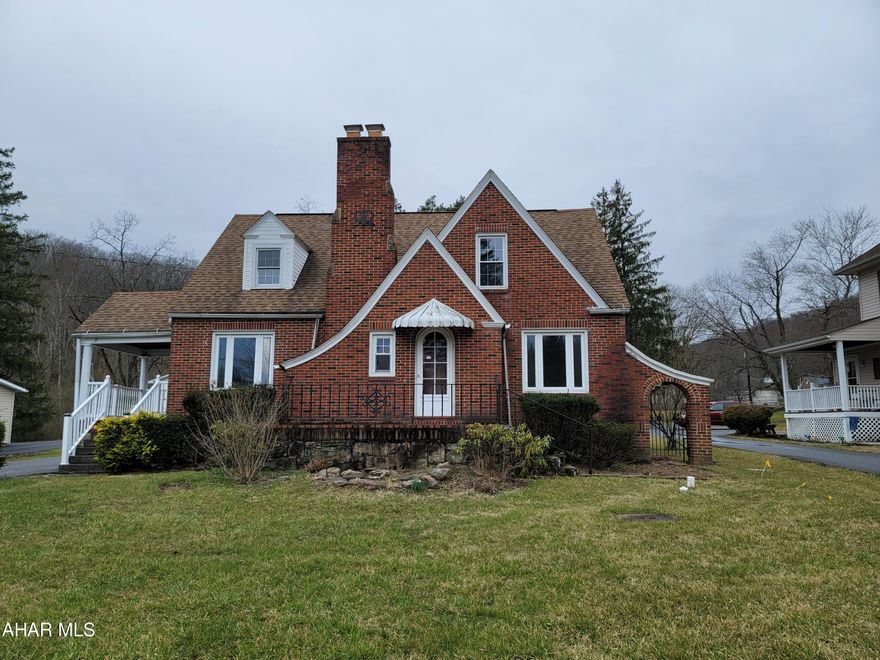 Your chance to own a unique brick tudor style home with beautiful refinished hardwood floors and so much character inside and outside! This house has 4 large bedrooms and 3.5 bathrooms! The outside brickwork and back entertaining space reminds you of a simpler time, and the modern kitchen gives you all the ease of todays conveniences. Large enclosed patio area would be great for summer parties. Beautiful fireplace and staircase. Front door is custom original round-top door. Amazingly attractive home.