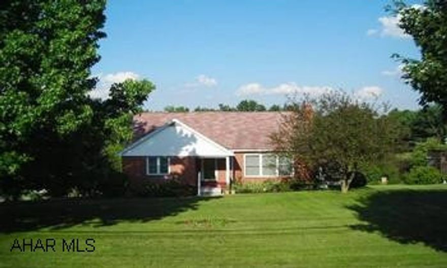 Priced below appraised value!  This solidly built brick 1.5 story home offers 4 bedrooms, 2.5 baths on almost 2 acres!!  Two bedrooms on 1st floor, two bedrooms up!  Fireplace in livingroom, walkout basement with half bath, fruit trees and perennials, and a comfortable covered porch PLUS move in condition add to the appeal!  All appliances stay!  Call Tina today at 814.242.2047  Previous home inspection on file with listing agent.