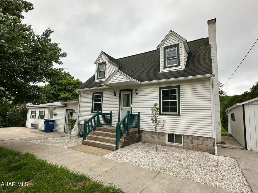 Spacious and updated cape cod in Snake Spring is awaiting its new owner! Smart home with various connectivity options makes this home efficient and modern. Countless updates throughout including a UV air treatment system with new heat pump. Main floor features a living area, dining room with smart thermostat, updated kitchen with luxury vinyl tile and beautiful quartz countertops, downstairs full bath and main floor bedroom or den. Walk through the breezeway to a spacious and versatile space with so many options for it's use. Opportunity for rental income! Use as an airbnb, guest suite or in-law quarters. Full kitchen, living area, studio style bedroom, sunroom and full bath. Upstairs you'll find the primary bedroom with electric fireplace and full en-suite bath as well as your 4th bedroom. Lovely private yard and 1-car garage or shed. This home needs nothing. It's as beautiful as it is functional! Set up your showing today.