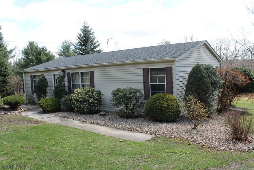 Welcome to this spacious piece of 25 acres of land with a 3 bedroom, 2 full bath home. Enjoy outdoor living with 2 porches where you can gaze on the view of this property. There are several sheds for storage as well as a 12x24 hunting cabin. This home also features a 30 year roof.