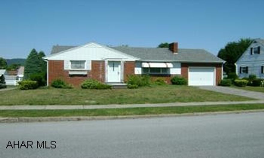 Brick rancher in town.  Two bedrooms, one car garage, close to stores, restaurants, pharmacies, hospital, banks. One story living!.