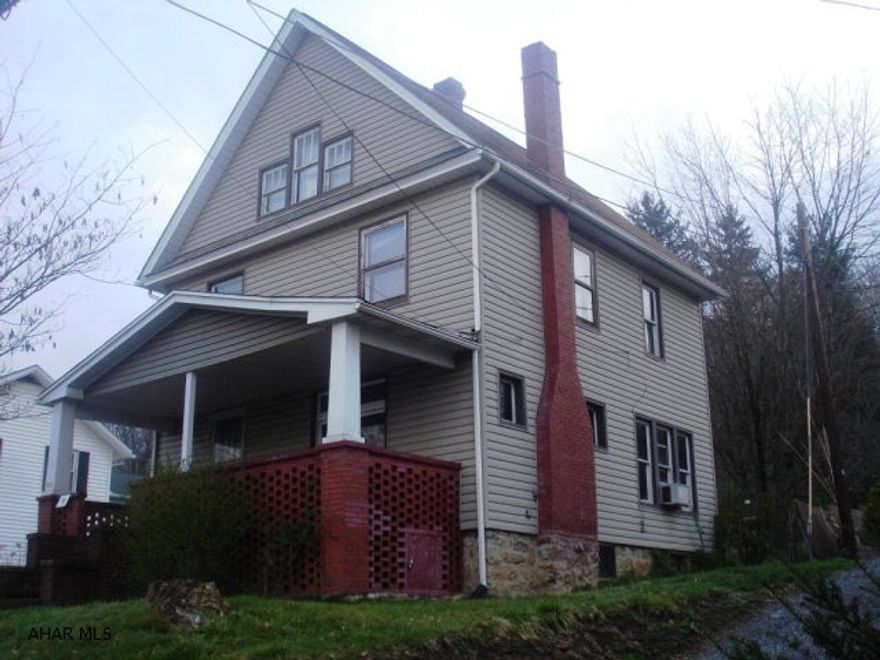 Solid home with hardwood trim and floors. Nice fenced yard in back. Brick Wood burning fireplace in Living Room. Third floor is large finished space. Home needs some TLC but has great potential. 1 car garage.