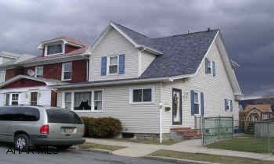 2 STORY VINYL SIDED WITH DETACHED GARAGE. SUPER ATTRACTIVE 2 STORY. NEW SIDING, ROOF, WINDOWS, KITCHEN & BATH. SHOWS BEAUTIFULLY. NEWER FURNACE WITH A/C. HUGE DECK PORCH. GARAGE AND PARKING PAD. FENCED YARD.