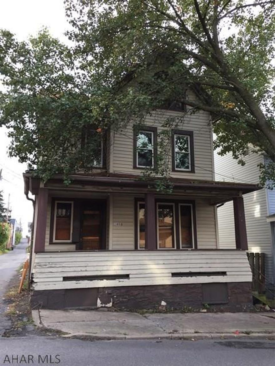 Fixer upper with great architecture! Sold AS IS.