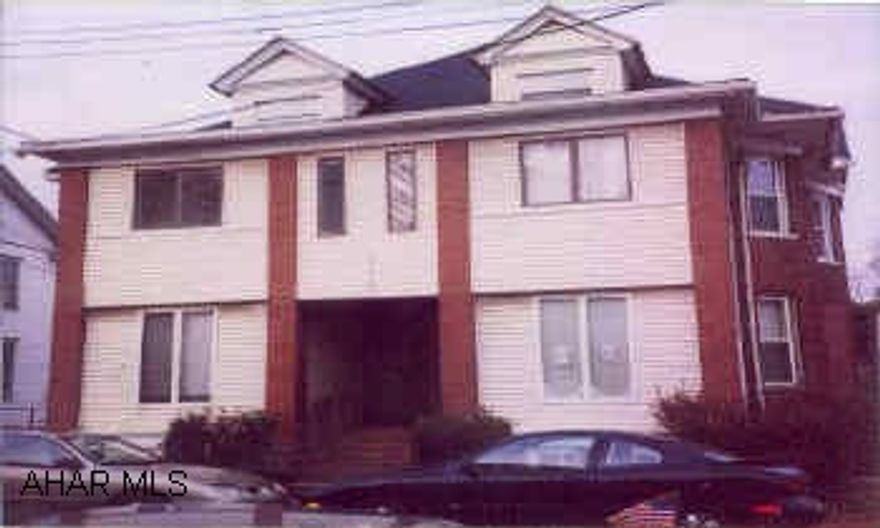 Great updated brick & vinyl, 4 units good income, remodeled, separate utilities. Newer roof, new windows, furnace. A must see!