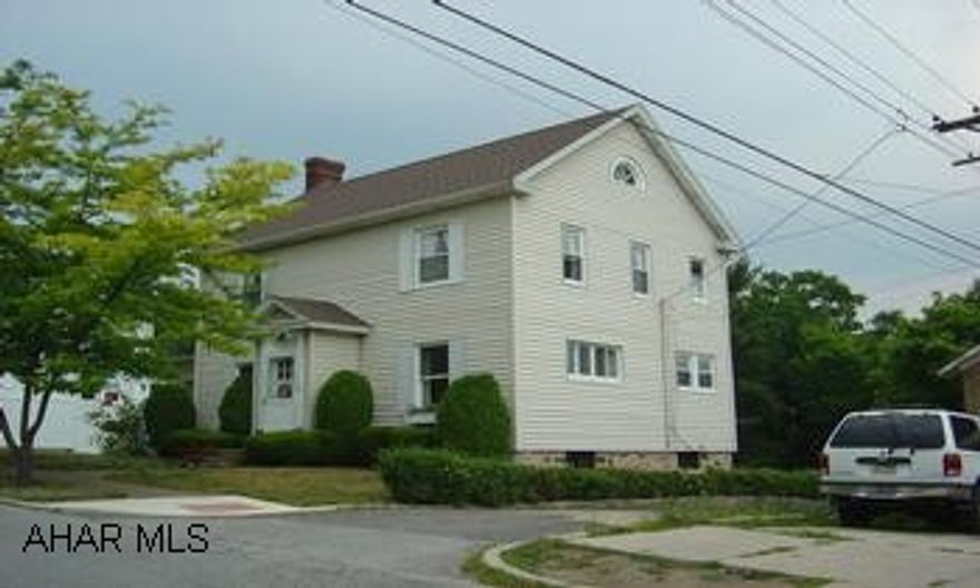 New Roof, Wndows, Furnace- 3 Bedroom , Vinyl - Living room with fireplace -Dinning room - Hardwood Floors - 1st Floor Laundry.