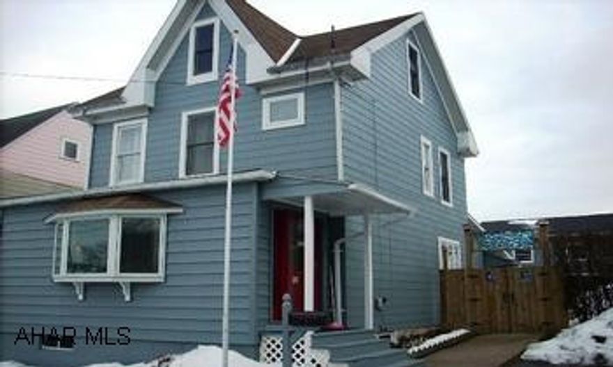 2 1/2 STORY HOME 1829 SQFT OF HEATED LIVING SPACE. 1 1/2 CAR HEATED GARAGE WITH WORKSHOP--NICELY UPDATED.  CALL WALLY ROSSI 935-9259. NICELY REMODLED TYRONE HOME, 1829 SQFT OF LIVING SPACE, CUSTOM KITCHEN, LIVING ROOM, DINING ROOM, SUN ROOM, OFF STREET PARKING, 1 1/2 CAR GARAGE WITH WORKSHOP, 200 AMP SERVICE, OAK FLOORING, CORIAN COUNTER TOPS.