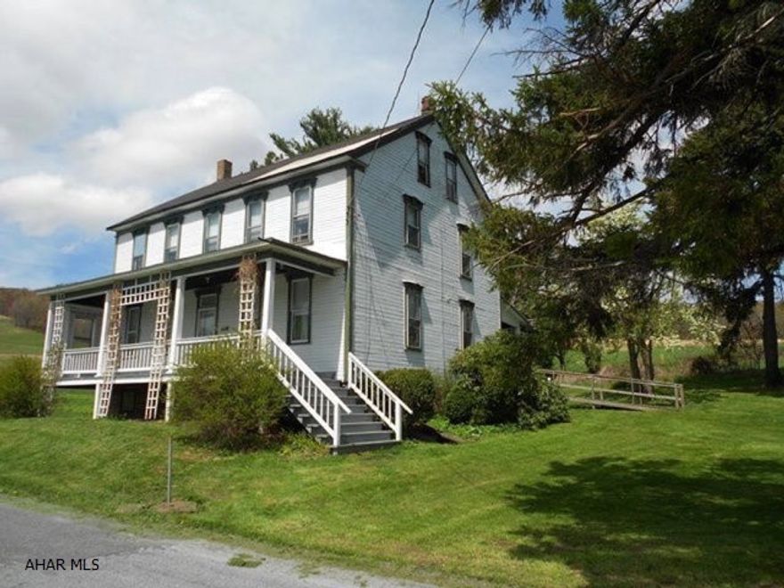 Imagine waking up to beautiful country views. This 69.44 +/- farm has everything you would want. Large 8 room double story farmhouse, 4 bedroom, 1 1/2 bath. Four rooms and pantry on first floor with charming front porch. 3 car detached garage, fields with approximately 50 acres cleared and 20 acres of woods. Fruit, nut trees and grapes with a stream on property. Full attic, and half concreted cellar with a second 6 ft. dugout for utilities, oil hot-water heat, wood clapped siding, and metal roof, rear porch with handicap ramp. It has various outbuildings including a two-story 80' x 40' hand hewn, post & beam, bank barn with horse stall.