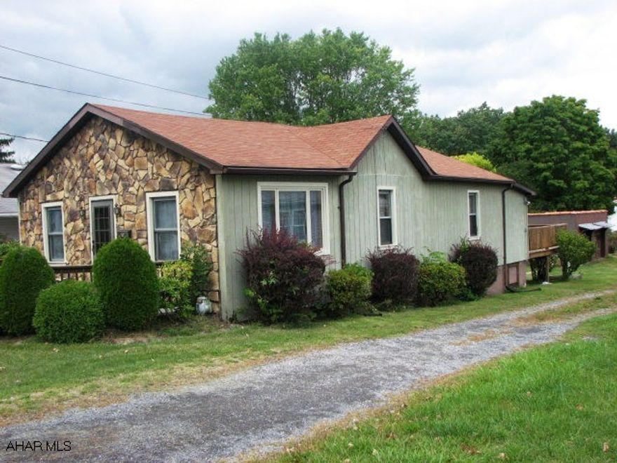 Convenient 1 story living, with modern Kitchen move-in condition. Large rear deck, yard, and 2 car garage. Very nice neighborhood. Close to school & hospital. Should qualify for FHA.