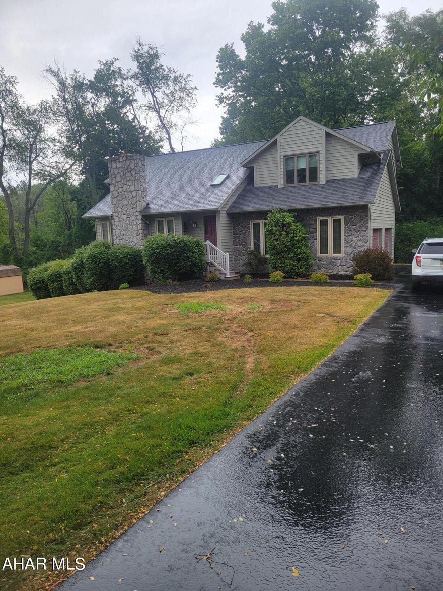 Beautiful 3 bedroom home in Rolling Hills!! This home backs up against the woods allowing for total privacy in the back yard. Featuring 3 bedrooms and 2 1/2  baths on the main living area and a fully finished basement that includes an additional bedroom, bath, family room and kitchen. This home has so much storage.  If your looking for a move in ready home this is the home for you!!