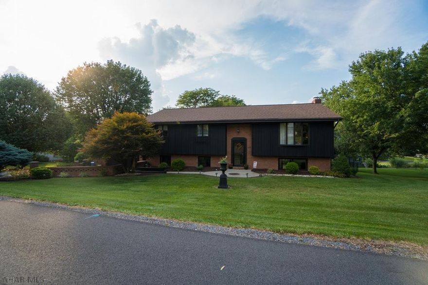 If you are looking for your forever home - this is the one! 4 bedroom, 3 bathroom brick bi-level in Penn Farms. Enjoy the 1/2 acre fenced, treed lot with new heated, in-ground, fiberglass pool and fire pit. Lower level features family room with wood fireplace and wet bar, bedroom, and bonus cedar walk-in closet with all new flooring throughout. Main level features 3 bedrooms, large, spacious kitchen with granite counter-tops and plenty of storage. Dining room with sliding glass doors to the newly redone deck. Electric and gas heat.  Central air with extra AC units. Shed with electric and heat. So much to list, call to make a private showing!