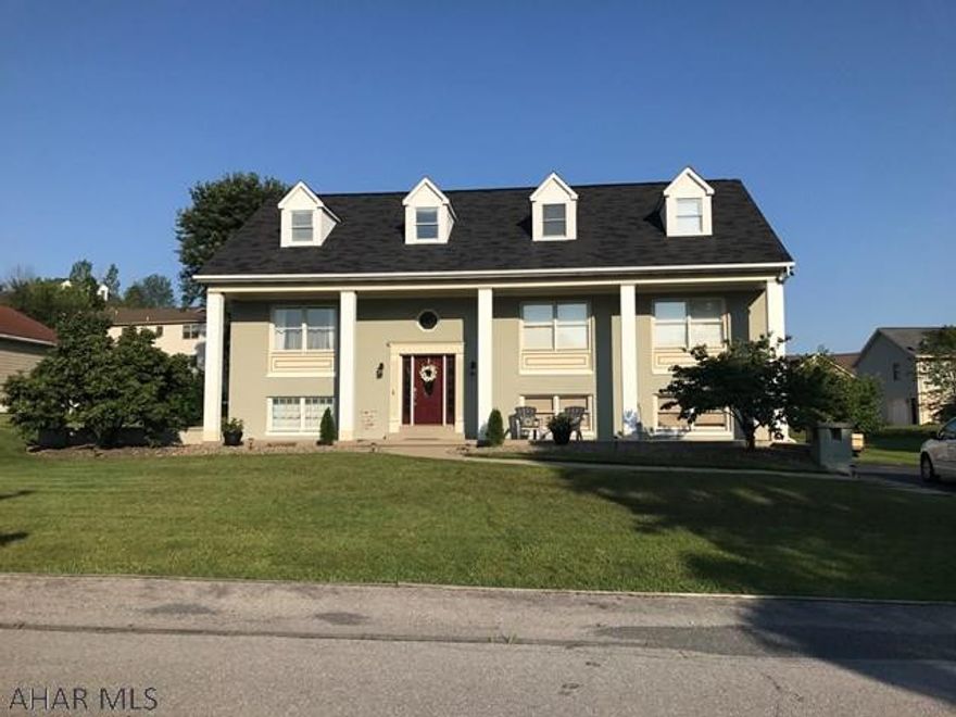 Unique 4 bedroom, 3 bath multi-level home, 18 ft ceiling in living room. Eat-in kitchen with maple cabinetry. Approximately 700 additional square feet finished in lower level, opening up to rear patio, flat yard.