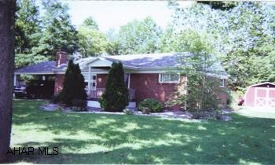 Brick Ranch brick ranch on .6 acre, small stream in back, Flood insurance required, shed & carport.