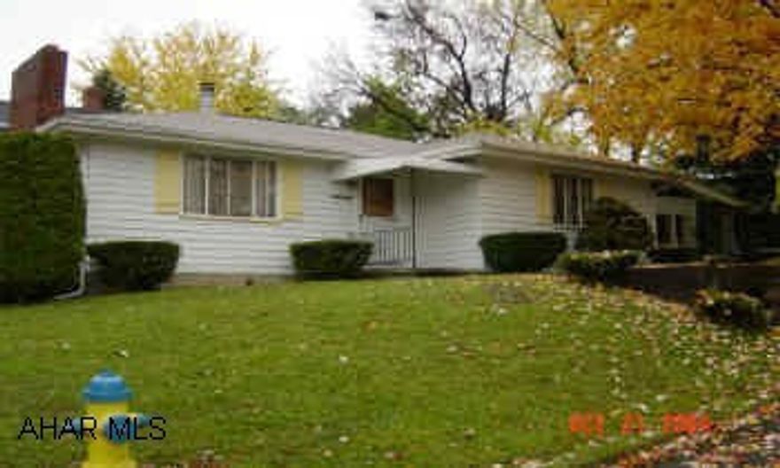 Great area, fireplace in LR, and Fam. Rm., new furnace, garage and carport, hardwood floors, shed corner lot.