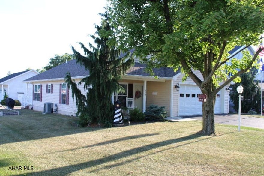 3D tour available - check the links or go to the brokerage website. One floor living right in the heart of Martinsburg. Spacious kitchen with dining area. Hardwood floors and a beautiful tile in the kitchen. This house features an over sized two car garage and a beautiful patio that you must see in person. Hand layed stones surround a fire bit with a screened in gazebo. If you enjoy a well kept home with outdoor guest entertainment space, then this is a must see!